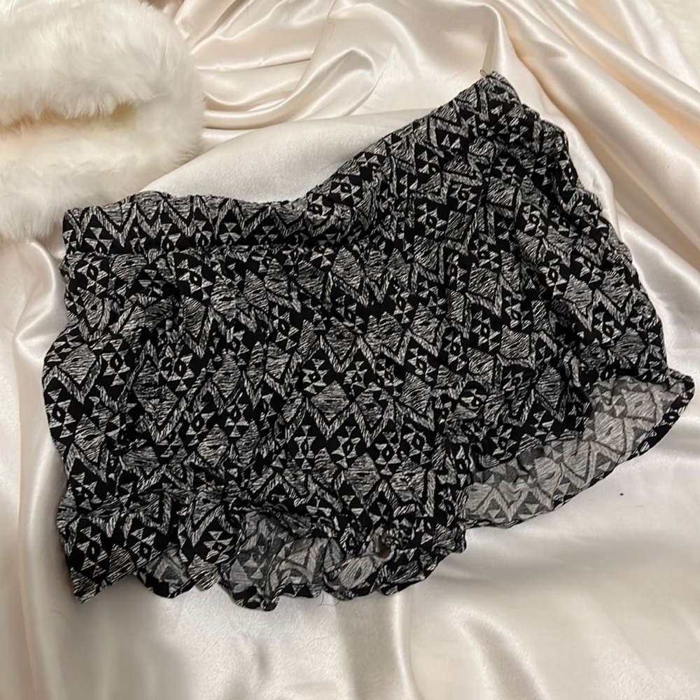 Divided - tribal pattern shorts